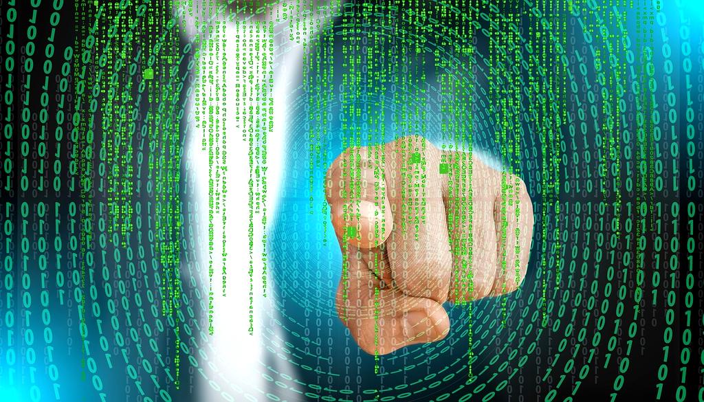 Person using a laptop with focus